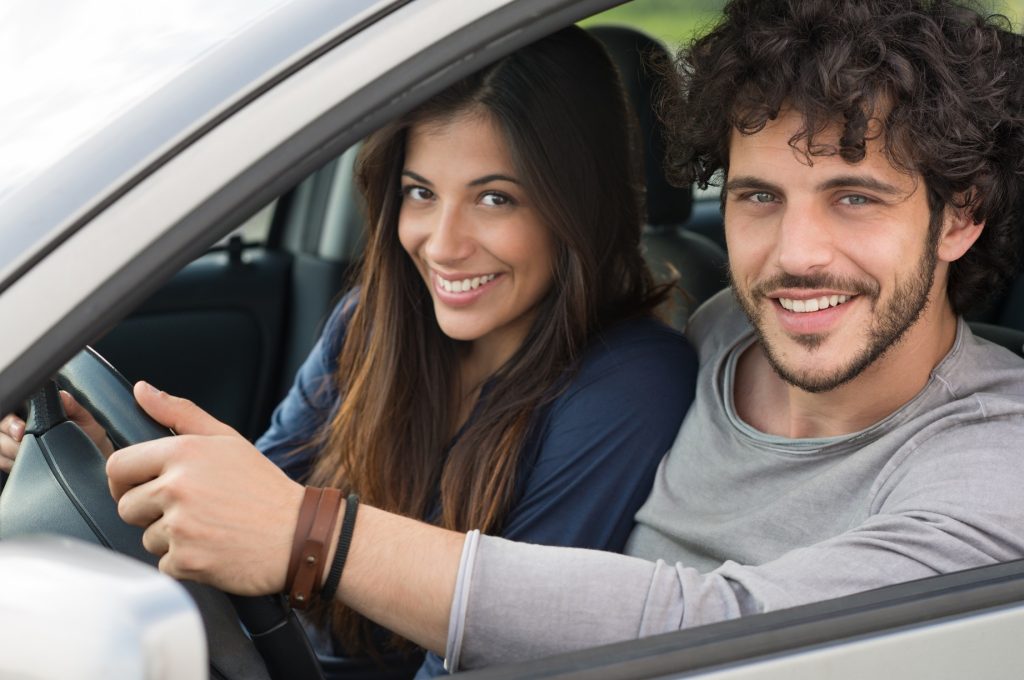 Image of a couple taking a vehicle for a test drive