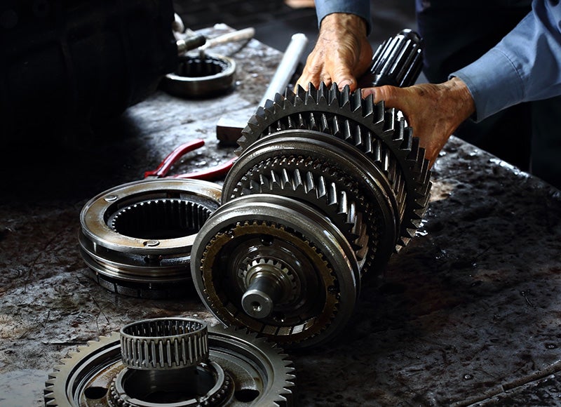 Service Technician working on a car